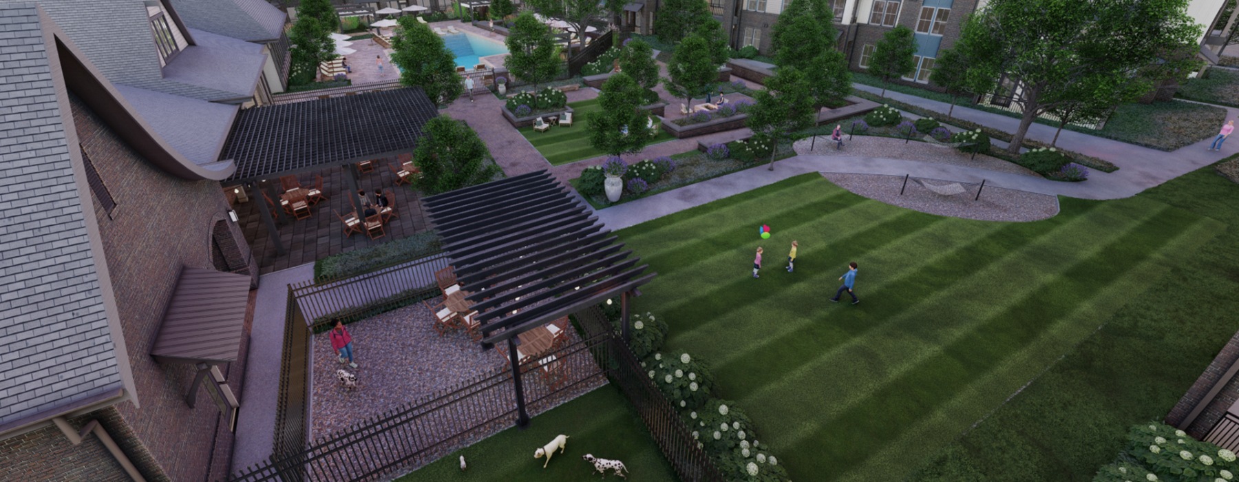 Aerial view of outdoor amenities including pet park, green space, and resort-style pool at Tapestry Beard Road Apartments in Charlotte, NC