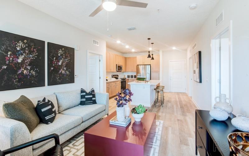 a living room with a couch and a table